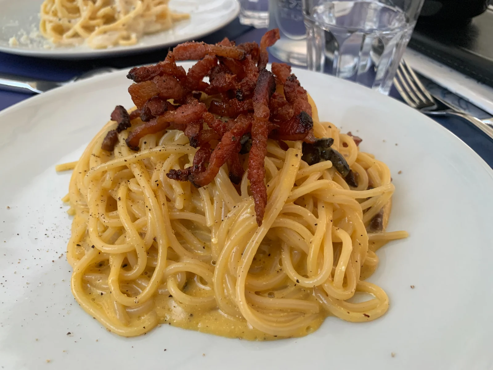 Spaghetti carbonara photographed in Trastevere, Rome